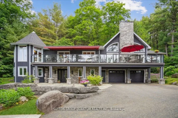 The exterior of an Ontario cottage with views of Lake Muskoka