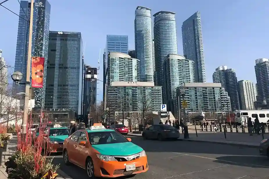 Toronto cab infront of skyline