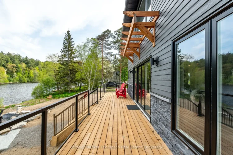 The deck of an Ontario Cottage overlooking Muskoka River