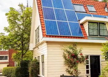 A house featuring solar panels installed on its roof.