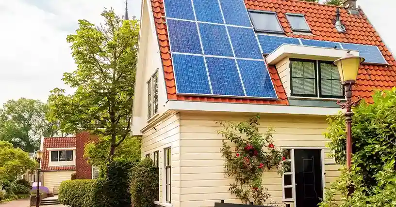 A house featuring solar panels installed on its roof.