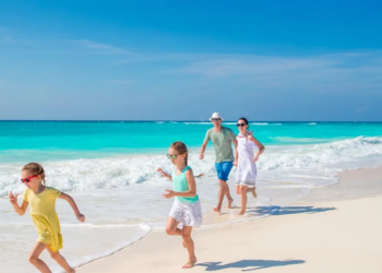 A family with kids on the beach