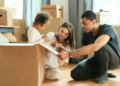 mom and dad packing with young child
