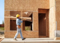 Construction worker building new home