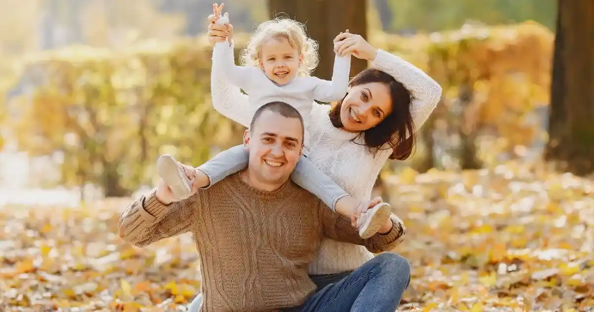 a happy family on an autumn day