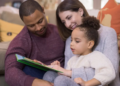 family reading a book