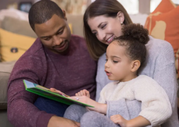 family reading a book