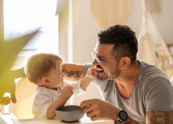 Dad and baby at home