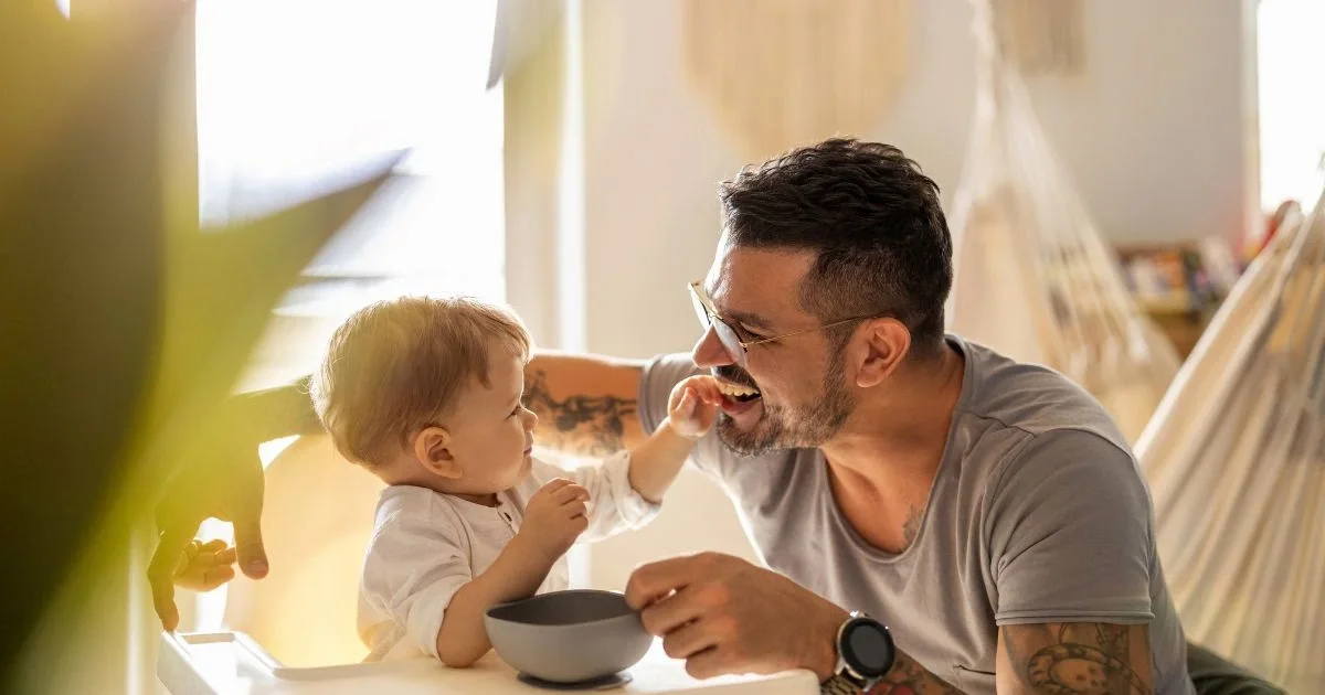 Dad and baby at home