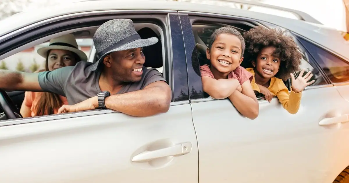 family driving in car