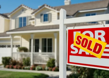 house with a sold sign