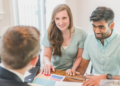 man and woman receive financial guidance