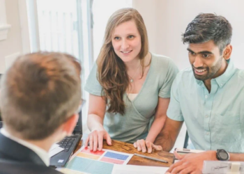 man and woman receive financial guidance