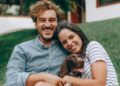happy couple with dog