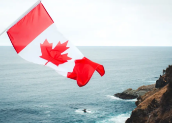 Canadian flag blowing in the wind