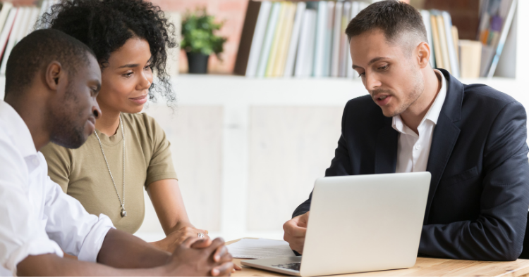 Real estate agent with clients