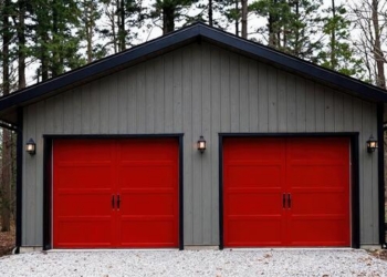 detached garage with red doors