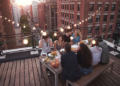 people having a rooftop dinner