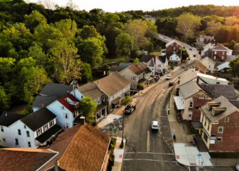 Sunny spring in Slatington, Pennsylvania. Residential area with architectural homes on Main Street