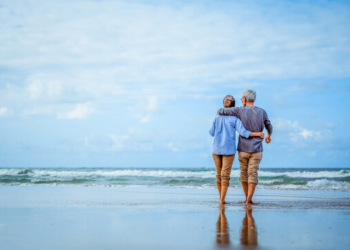 couple walking along the beach